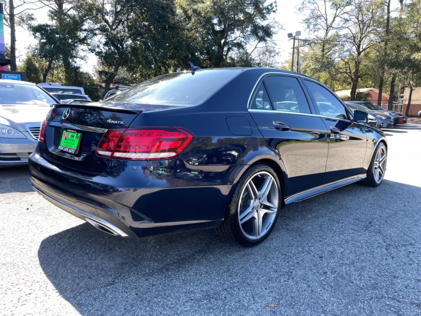 2014 BLUE MERCEDES-BENZ E-CLASS E 350 LUXURY 4MATIC (WDDHF8JB1EB) with an 3.5L engine, Automatic transmission, located at 5103 Dorchester Rd., Charleston, SC, 29418-5607, (843) 767-1122, 36.245171, -115.228050 - Beautiful & Clean Interior with Leather, Sunroof, Navigation, Backup Camera, Push button start, CD/AUX/Sat/Bluetooth, Dual Climate Control, Power Everything (windows, locks, seats, mirrors), Power Rear Sunshade, Heated/Memory Seating, Keyless Entry, Alloy Wheels. Clean CarFax (no accidents reported! - Photo#6